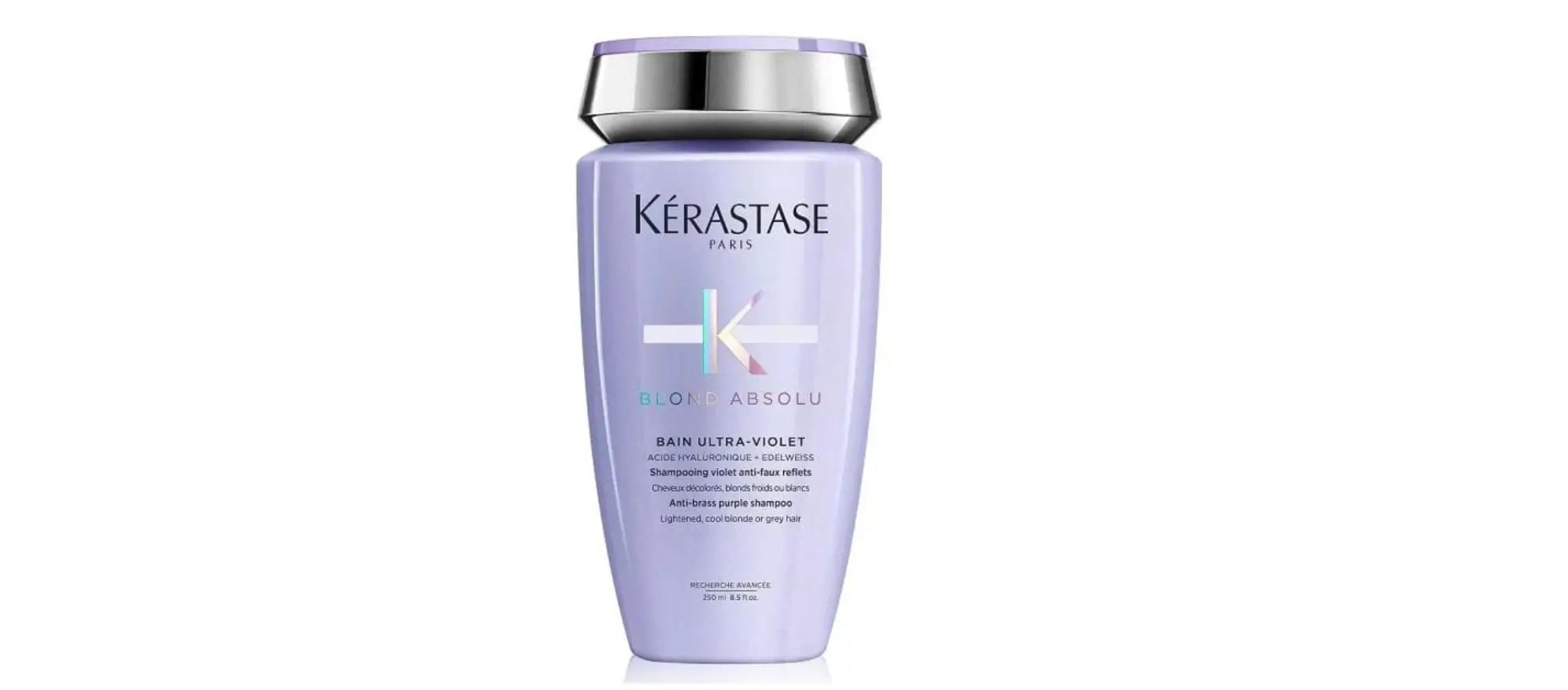 Lila Shampoo-Flasche mit Silberkappe aus Kérastase Shampoo Kollektion