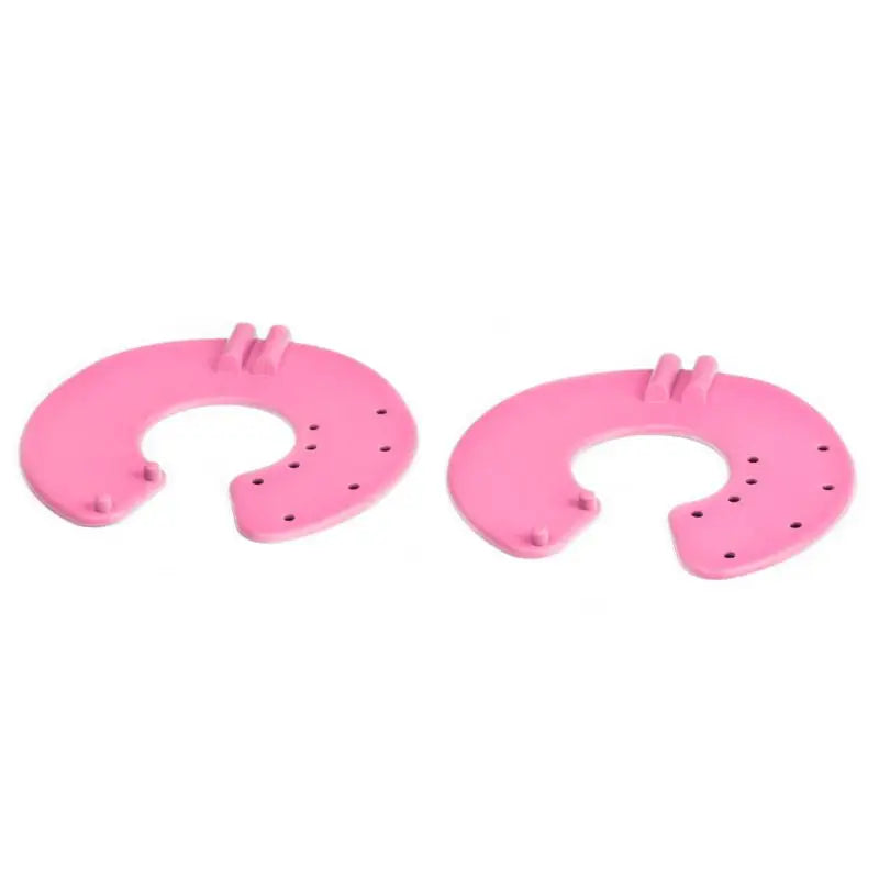 Zwei pinke pferdshufeisenförmige Türstopper für Elektrostimulation Gerät Classic