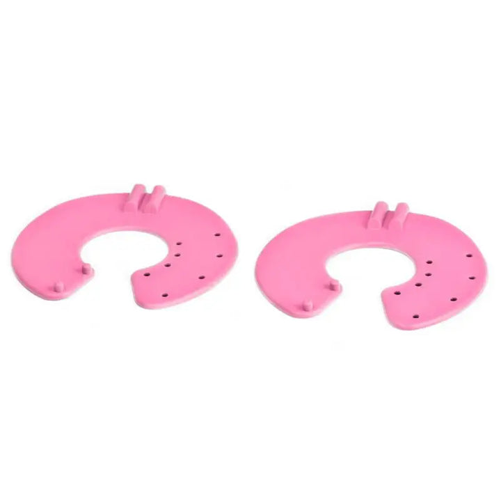 Zwei pinke pferdshufeisenförmige Türstopper für Elektrostimulation Gerät Classic