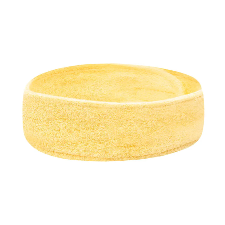 Gelbes Frottee Kosmetikband für Haare und Make-up Anwendung