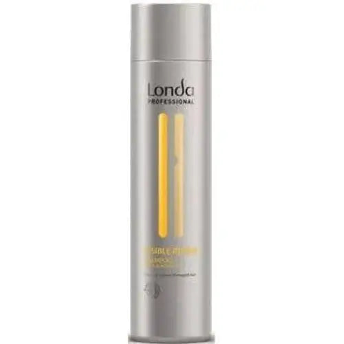 Silberne Haarspray-Dose neben Londa Professional Visible Repair Shampoo