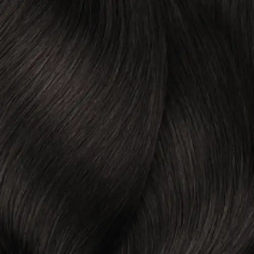 Dunkelbraunes, welliges Haar mit L’Oreal Professionnel Inoa Haarfarbe