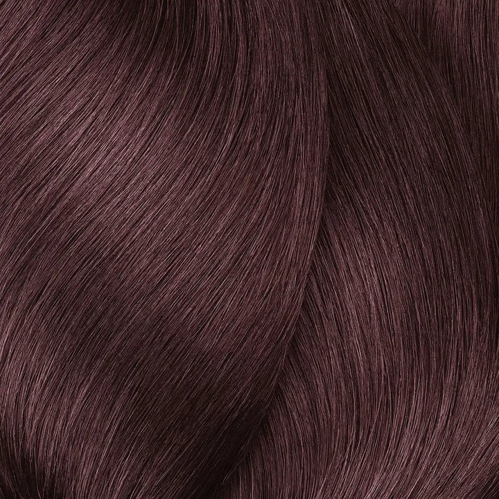 Welliges dunkles kupferfarbenes Haar mit L Oreal Professionnel Inoa Haarfarbe