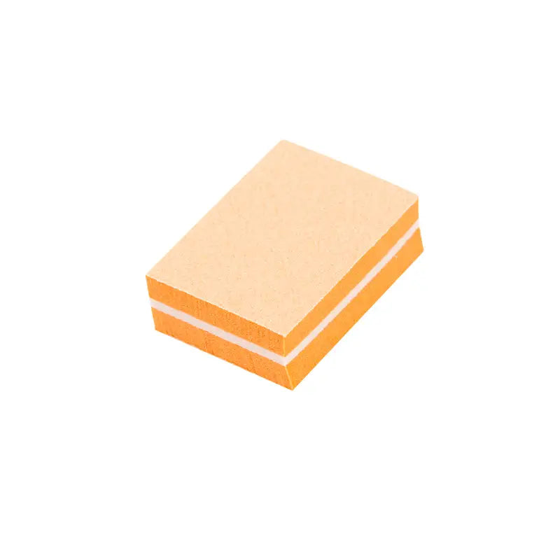 Orange und beiger Nagelpolierblock Mini-Polierblock Orange 50 St. auf einem weißen Hintergrund