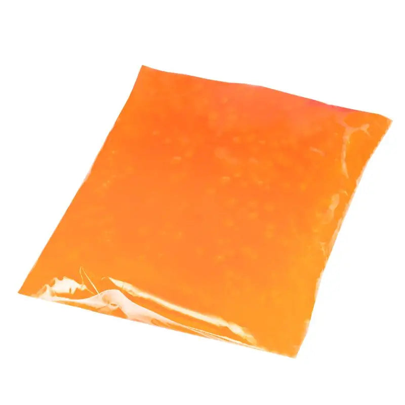 Orangeflüssigkeit in einer Plastiktüte für Paraffin 200g Orange Produkt