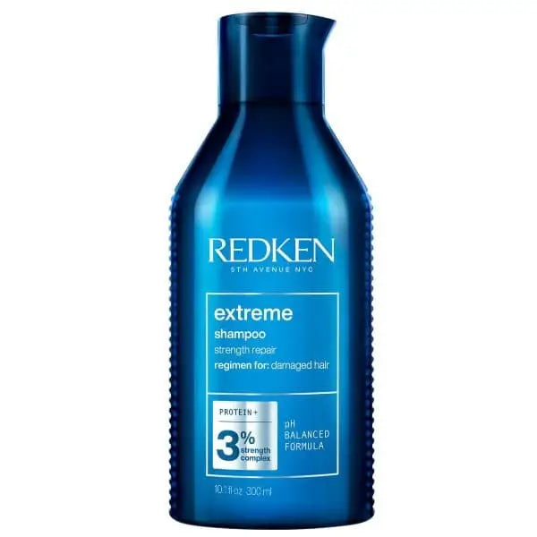 Blaue Flasche Redken Extreme Shampoo für geschädigtes Haar auf Produktanzeige