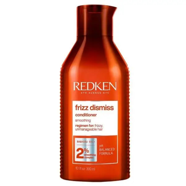 Redken Frizz Dismiss Conditioner Flasche gegen Frisierkrause für glatte Haare