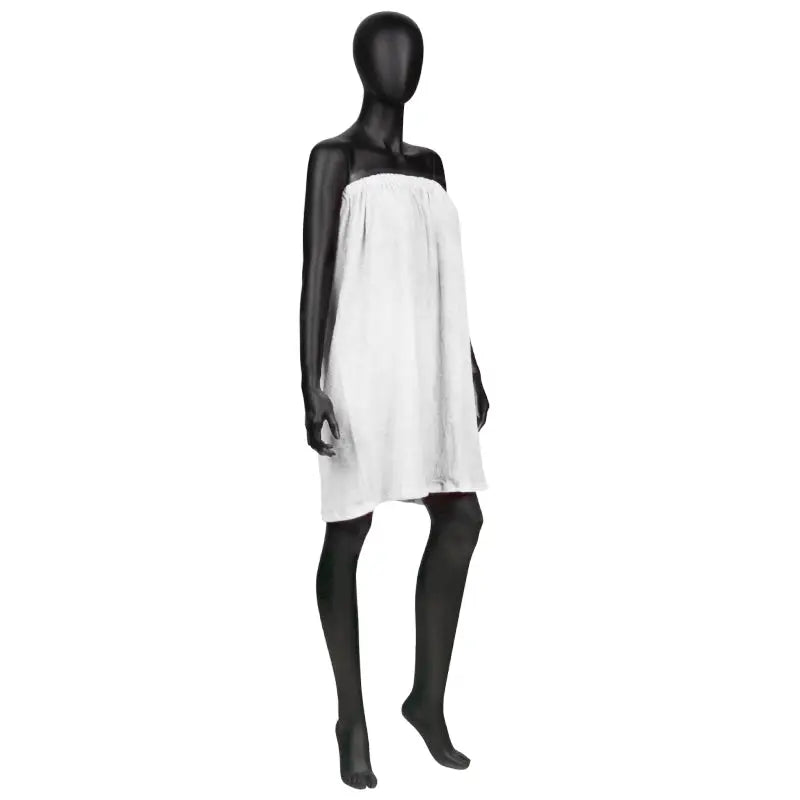 Schwarzer Mannequin mit weißen Frottee-Handtuch, Produkt Umhang Frotte Nr. 1 weiß