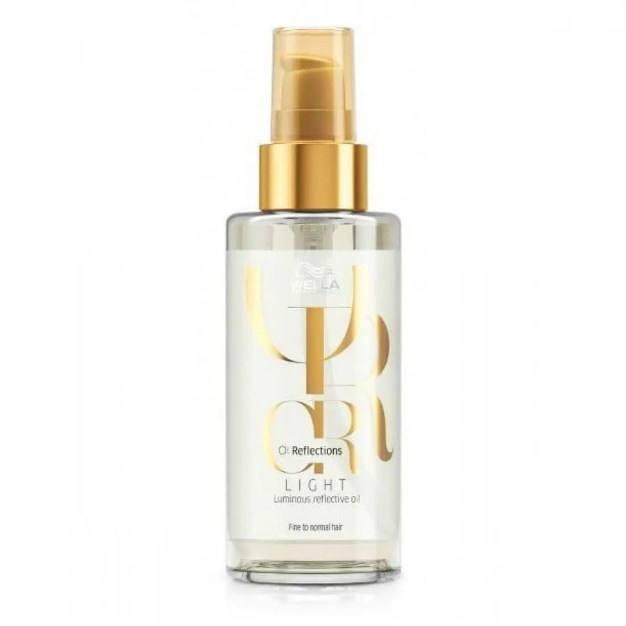 Wella Professionals Oil Reflections Light Luminous Reflective Oil in klarer Flasche mit goldener Pumpe