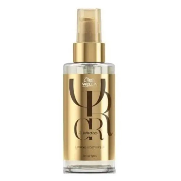 Wella Professionals Oil Reflections luminöse Glättungsöl in klarem Flasche mit goldener Pumpe