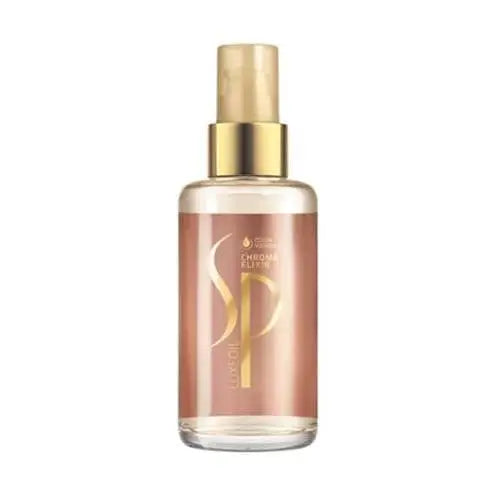 Wella SP Luxe Oil Chroma Elixir Haaröl in klarer Flasche mit goldener Pumpe